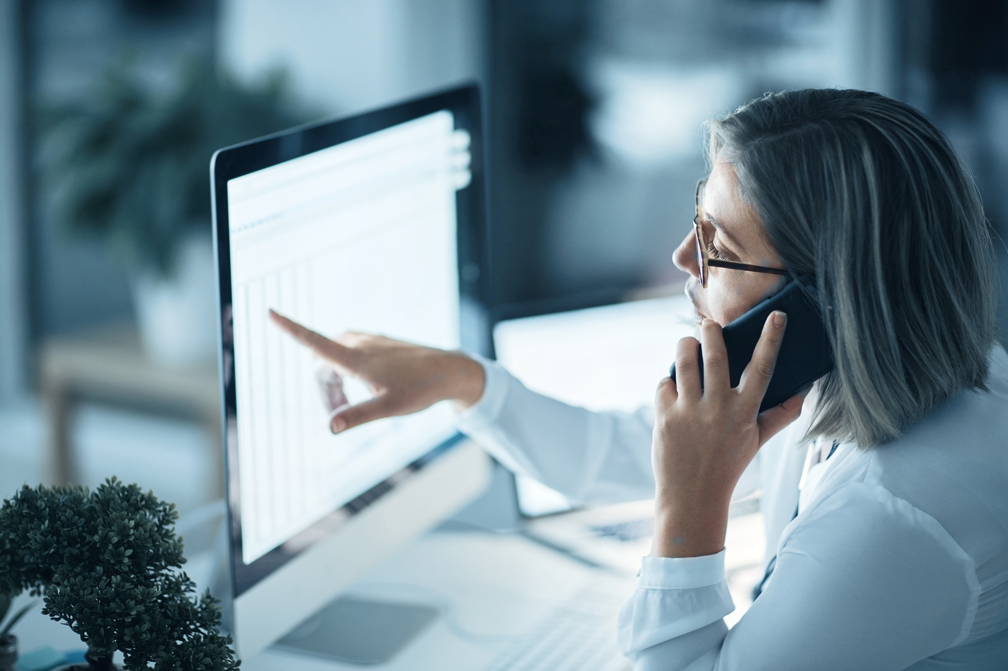 Quality professional reviewing digital documentation to support quality management, compliance, validation, and process improvement in life sciences.