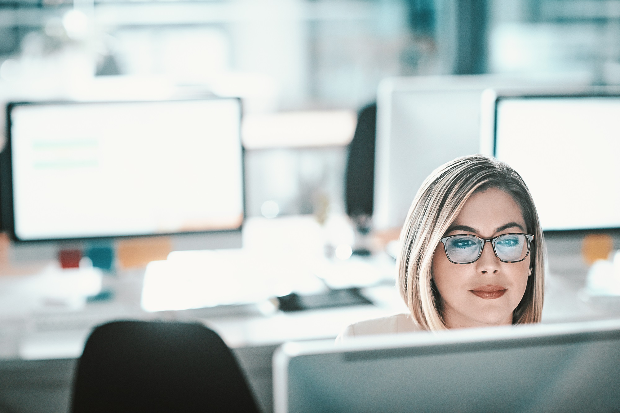 Technology professional working in a digital operations environment to support secure and reliable enterprise IT services